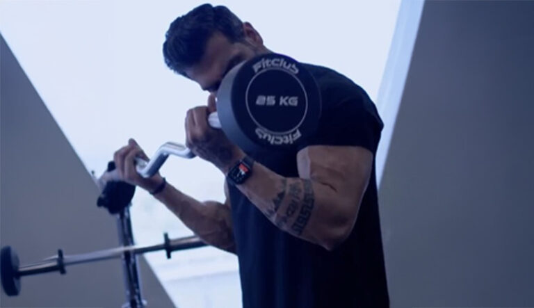 man performing a weightlifting exercise