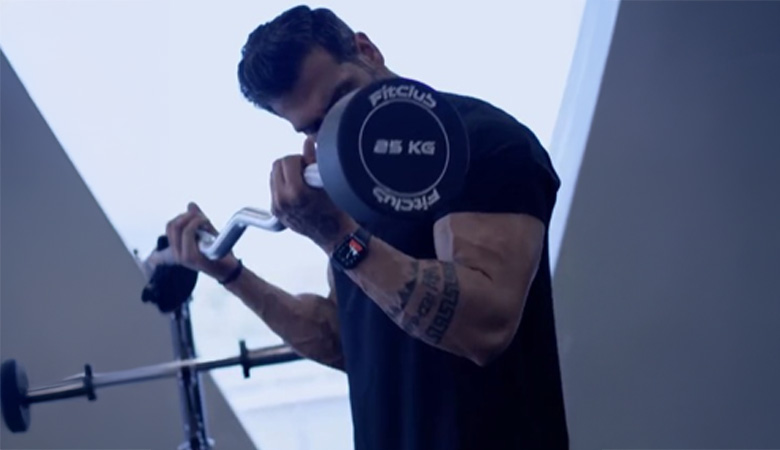 man performing a weightlifting exercise