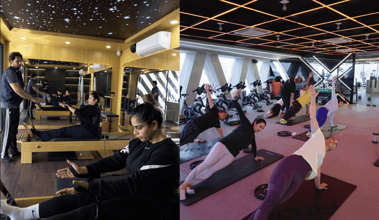 “People exercising indoors, including pilates training with reformer machines and a group yoga class in a modern fitness studio.”