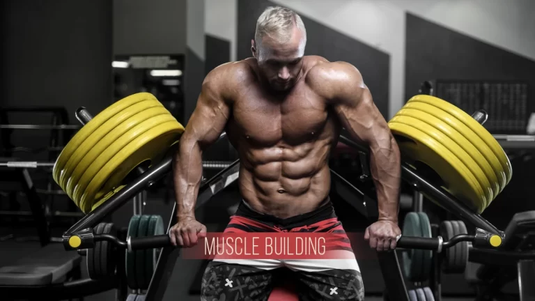Muscular man performing heavy plate-loaded chest press workout in gym for muscle building and strength training